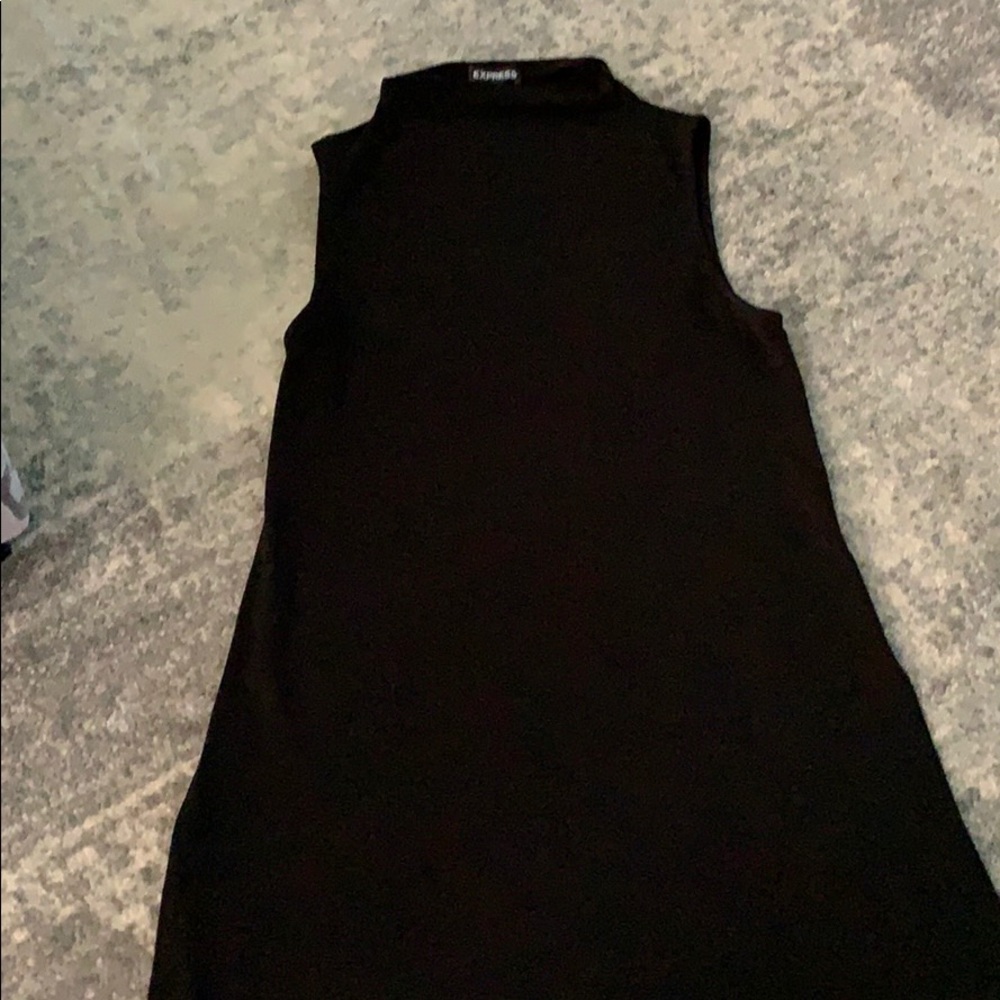 Express, black long tunic top with side slits.